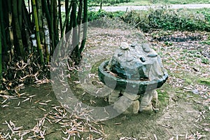 An abandon ancient manual stone mill in countryside in China