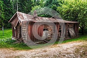 Abandon collapsed log cabin photo