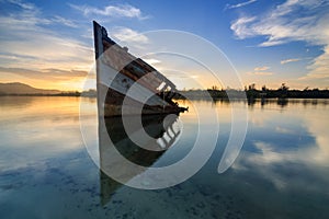 Abandon Old wreck on the shore , Borneo , Old fishing boat