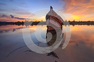 Abandon Old wreck on the shore , Borneo , Old fishing boat