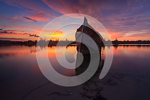 Abandon Old wreck on the shore , Borneo , Old fishing boat