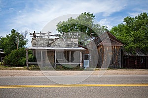 Abandon store house at Badland national park during summer.