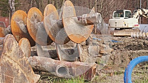 Abandonded Heavy Machinery Industrial Equipment Left Unsecured and Unsupervised on Empty Construction Site with No Workers Around