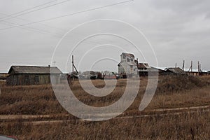 Abandoned agricultural farm of animal husbandry unprofitable enterprise destroyed elevator