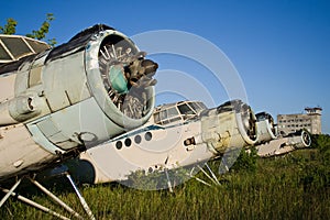 Abandoned airport. Old Soviet aircraft Antonov An-2