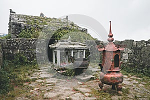 Abandoned altar complex with incense burners on Wugong Mountain in Jiangxi, China