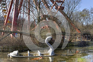 Abandoned amusement park with a Ferris wheel