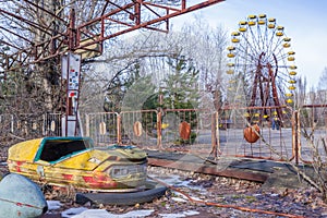 Abandoned amusement park in Pripyat, in Chernobyl Exclusion Zone, Ukraine photo