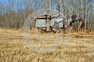 Abandoned antique thresher