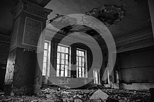 Abandoned assembly hall at the School, house of art. The concept of destruction and decline of culture and art. black and white