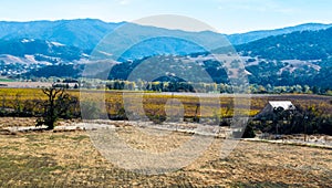 Abandoned barn with fallow field near Los Padres National Forest photo