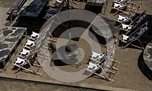 Abandoned Beach Bar With Empty Deck Chairs During Corona Crisis