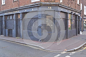 Abandoned boarded up old pub London