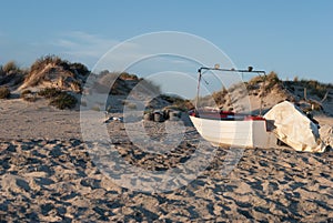 Abandoned boat on the beach photo