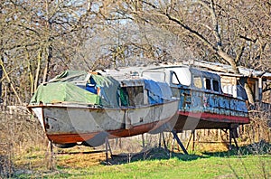 Abandoned boat in the forest