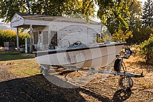 An abandoned boat on land near the Columbia River in Maryhill