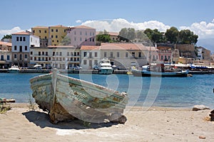 Abandoned boat on the shore. Greece