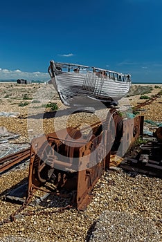 Abandoned boat and winch equipment on Dungeness beach