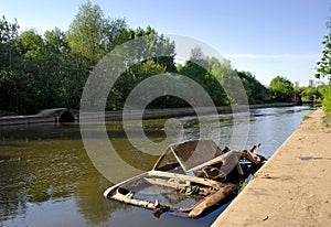 Abandoned body of the car in the river