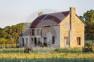 Abandoned brick farm house in the Texas hill country