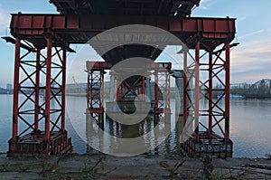 The abandoned bridge was reinforced with special supports to prevent further destruction. Kyiv, Ukraine