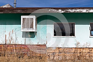 Abandoned building with an antique air conditioner