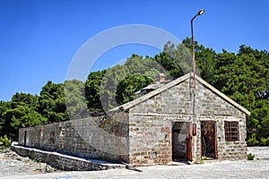 Abandoned building on Goli otok, political prison in ex Yugoslavia photo