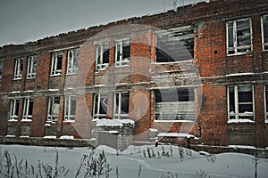 Abandoned building of red brick