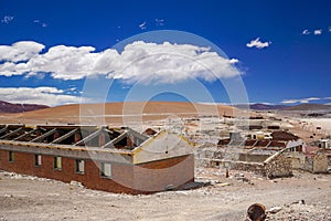 Abandoned decaying buildings in Mina La Casualidad in the puna desert near Salta, Argentina photo