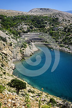 Abandoned buildings on Goli otok, political prison in ex Yugoslavia photo