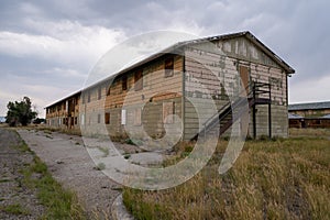 Abandoned bunkhouse or hotel building in the ghost town of Jeffrey City Wyoming