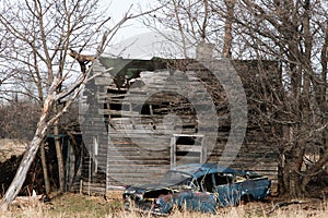 Abandoned cabin and car