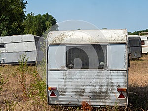 Abandoned campsite with old caravans