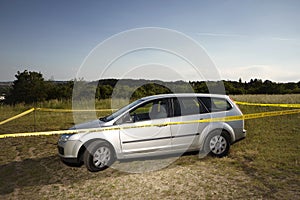 Abandoned car left in fields by criminal