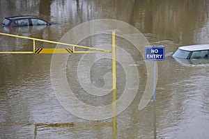 Abandoned Cars Submerged In Flood Water In Parking Lot In Oxfordshire UK January 2024