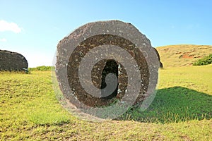 Abandoned Carved Moai Statues` Huge Topknots Called Pukao Scattered on Puna Pau Volcano, the Red Scoria Quarry on Easter Island