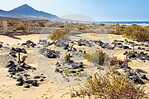 Abandoned cemetery on Cofete beach in the south of Fuerteventura Island