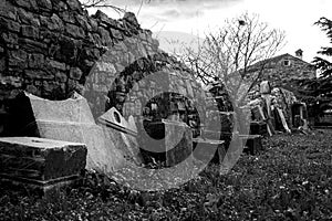 Abandoned cemetery old cement gravestones