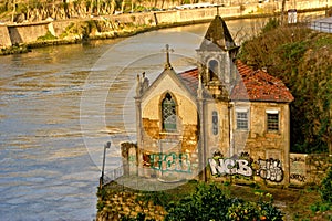 Abandoned chapel near Douro river in Vila Nova de Gaia photo