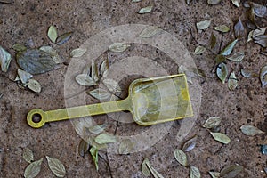 Abandoned child`s toy spade