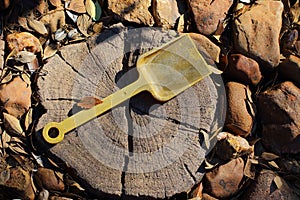 Abandoned child`s toy spade