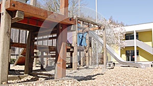 Abandoned Children Playground in quarantine - nobody playing outside, stricktly forbidden - smooth tracking shot