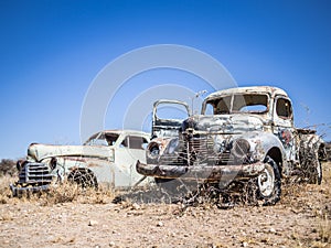 Abandoned classic cars rusting in Namib desert, Namibia