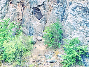 Abandoned and collapsed limestone adit in canyon mine