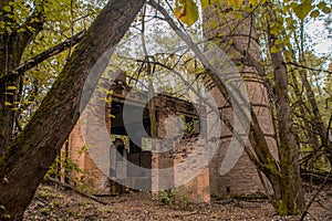 Abandoned collapsed ruined old industrial building in Chernobyl ghost town