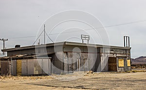 Abandoned Commercial Building With Boarded Up Windows