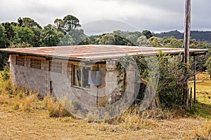 Abandoned Concrete Block Country House In Ruins