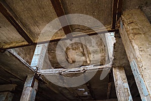Abandoned concrete construction with destructed ceiling