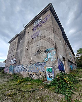 Abandoned concrete warehouse with vandalism in Germany