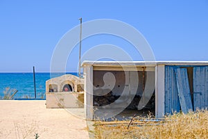 Abandoned construction by a barley field overlooking the sea at Argaka, Cyprus